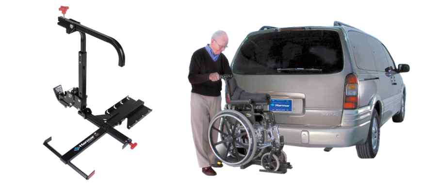 Image of Harmar AL003 attached to back of silver minivan with man unloading his manual wheelchair