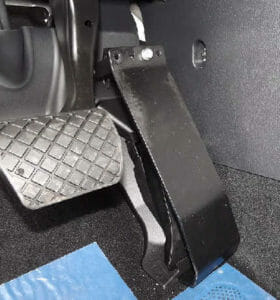 image of a gas pedal guard inside a vehicle
