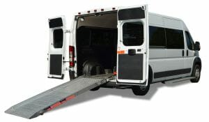 Rear view of a Ram Promaster, ADA handicap van with a fold-out ramp from rear deployed