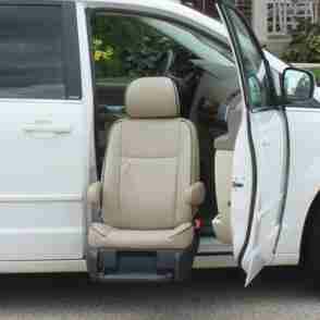 image of handicap seat coming out of van