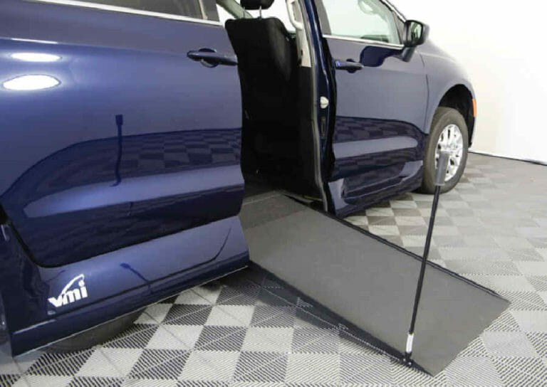 Blue VMI Chrysler Voyager wheelchair van with ramp out