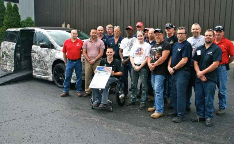Wounded Warrior receives camo wrapped wheelchair accessible van from BraunAbility