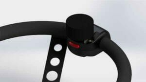 Sure Grip Counter Weight adaptive driving aid on a steering wheel